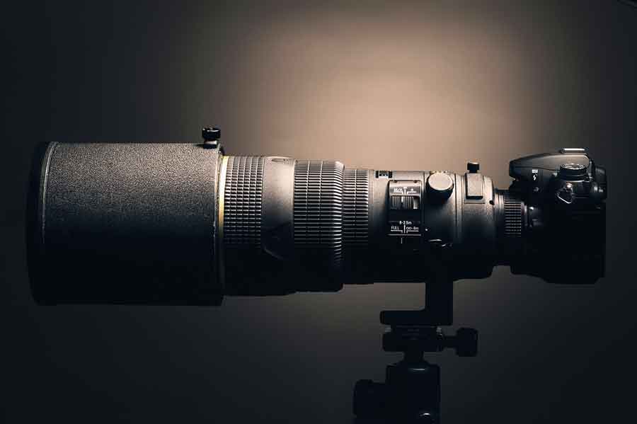 Attrezzatura obiettivo fotografo